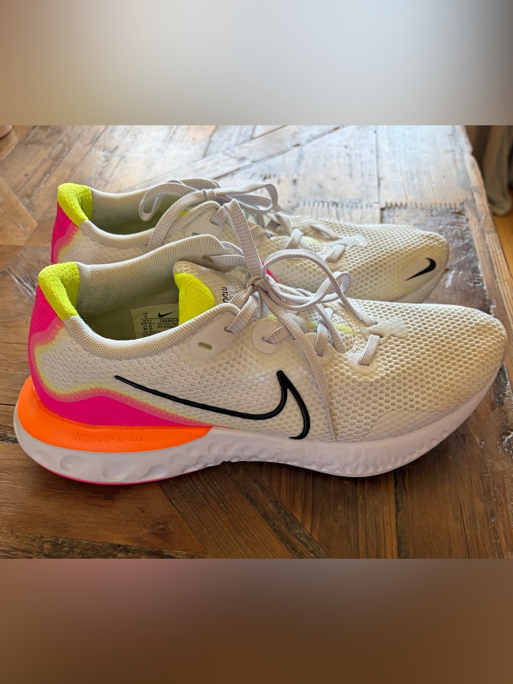 Nike Women's White Running Shoes with Neon Pink & Yellow Accents